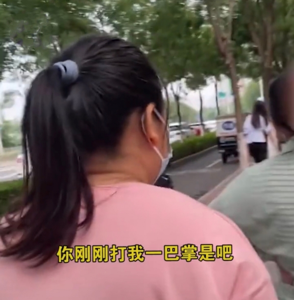 北京女子因做核酸排队离太近遭掌掴，掌掴者：你不是想让我打你吗