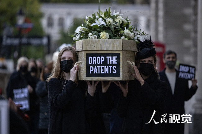 英国伦敦举行“抬棺游行”反对新冠疫苗专利 呼吁全球疫苗公平分配编辑图片素材-ID:1352986153
